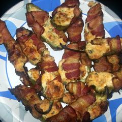 A picture of Bacon wrapped jalapeno poppers.