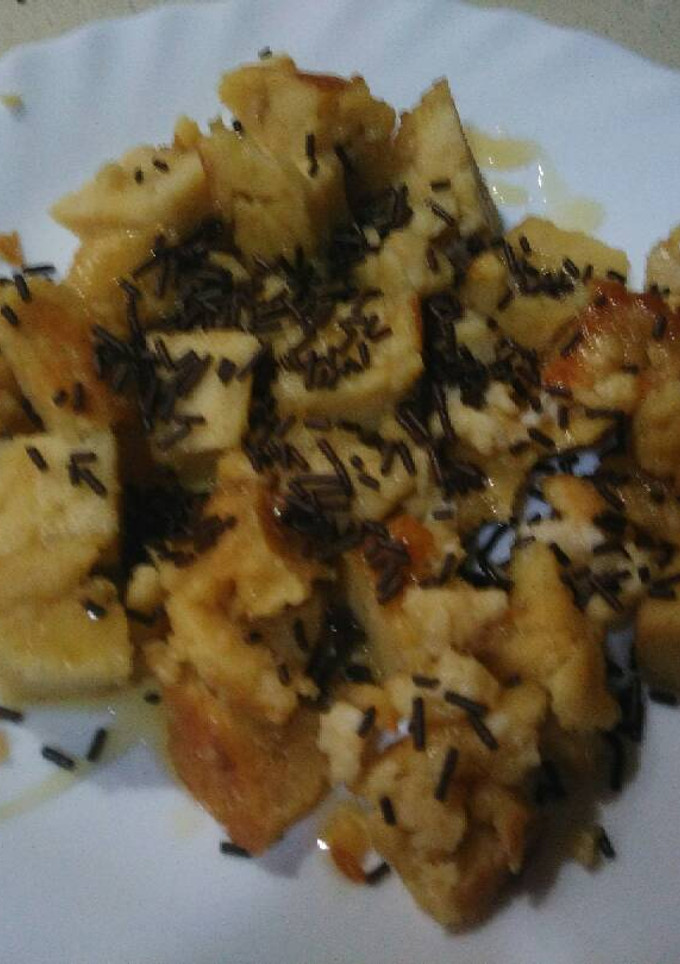 Una foto de Postre de pastel de tortilla, con miel y fideos de chocolate