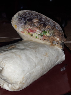 A picture of Grilled chicken and braised pork burrito.