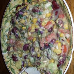 A picture of tuna , beans , corn salad.