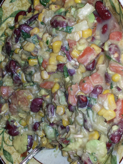 A picture of tuna , beans , corn salad.