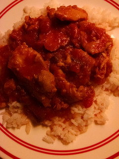 A picture of Chicken with bacon tomato sauce.