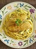 Filete de Tilapia sobre Espaguetis a la Parmesana