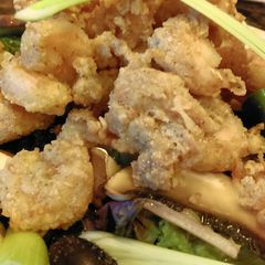 A picture of Fried Popcorn Shrimp Parmesan.