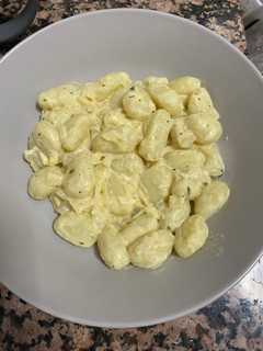 Una foto de Gnocchis con salsa de queso