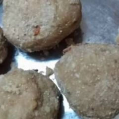 A picture of Wheat flour ladoo or pinni.