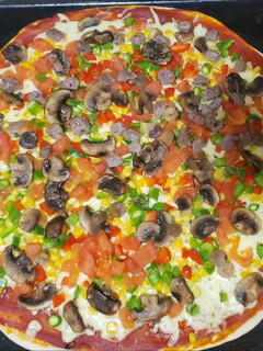 Una foto de Pizza casi vegetariana