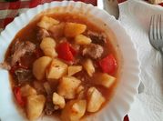 Una foto de patatas guisadas con manteca