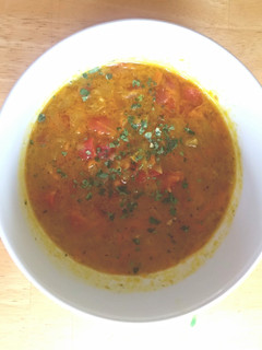A picture of Indian curry coconut soup.