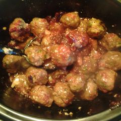 A picture of Holiday Meatballs w/Cranberry Sauce.