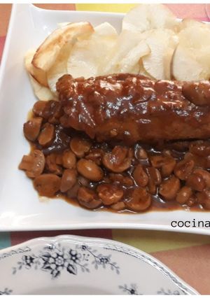 Una foto de Solomillo de cerdo a la cerveza con champiñones y yuca frita