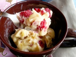 Banana ice cream with frozen raspberries
