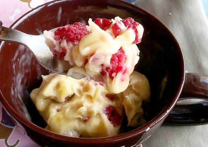 Banana ice cream with frozen raspberries