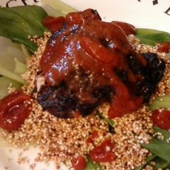 A picture of BBQ Chicken Quinoa on a bed of pak choy.