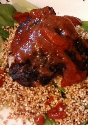 A picture of BBQ Chicken Quinoa on a bed of pak choy.