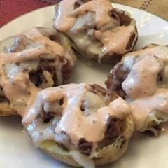 A picture of Philly Cheesesteak Potato Bites with Pub Style Aioli.