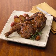 A picture of Roasted Half Chicken with Chickpea and Gigande Hoppin' John.