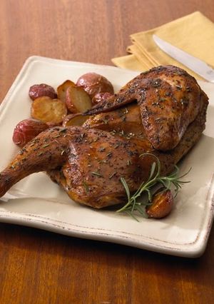 A picture of Roasted Half Chicken with Chickpea and Gigande Hoppin' John.