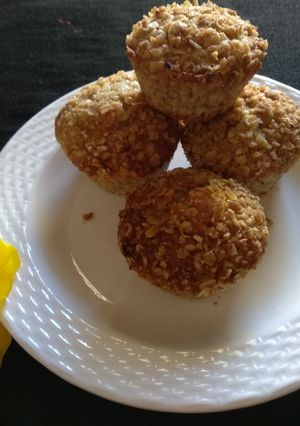 A picture of Vegan banana nut muffins- with crunchy oat topping.