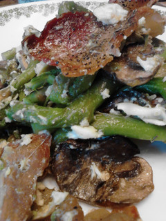 A picture of Egg topped Bacon Mushroom Aspargas.