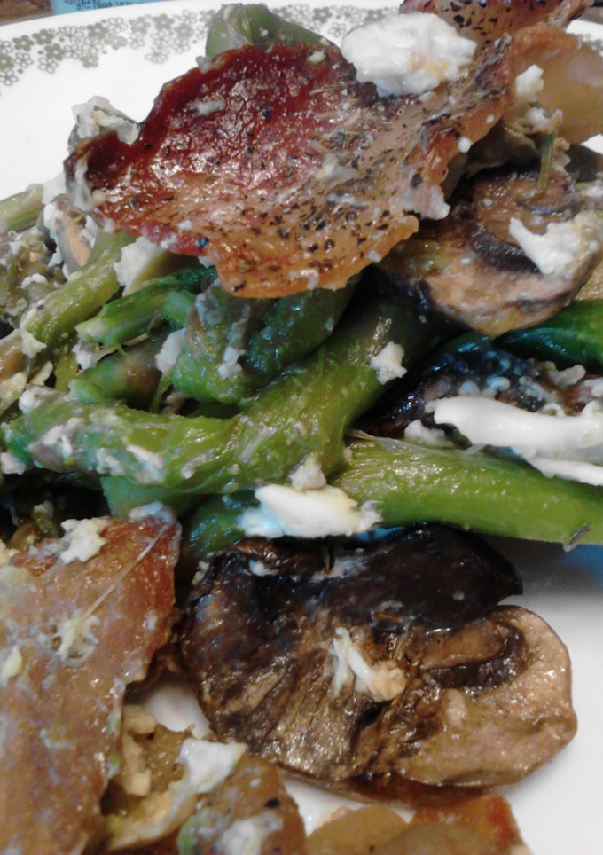 A picture of Egg topped Bacon Mushroom Aspargas.
