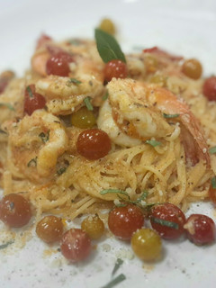 A picture of Capellini in Fresh tomato cream sauce.
