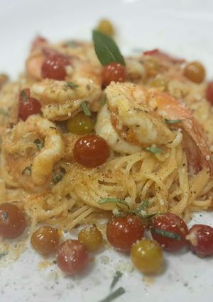 A picture of Capellini in Fresh tomato cream sauce.