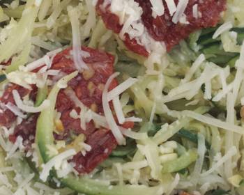 Popular Cuisine Zucchini and squash pasta with pesto and sun dried tomatos Delicious Nutritious