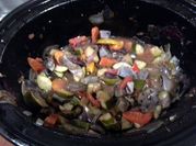 A picture of arrowroot with onion and tomato