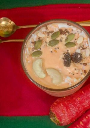 A picture of Carrot Milk Shake/ Creamy Carrot Smoothie/ Delicious And Nutritious Gajar Milk Shake.
