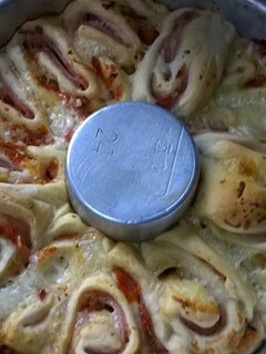 Una foto de Torta de pizza arrollada