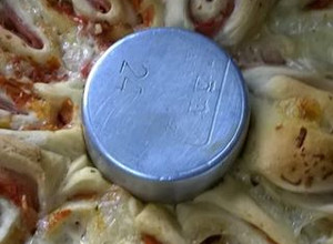 Una foto de Torta de pizza arrollada