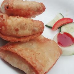 A picture of Box hari paties🥟🥠.
