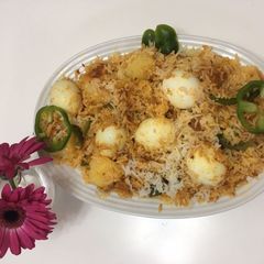 A picture of Eggs biryani/burmuda rice.
