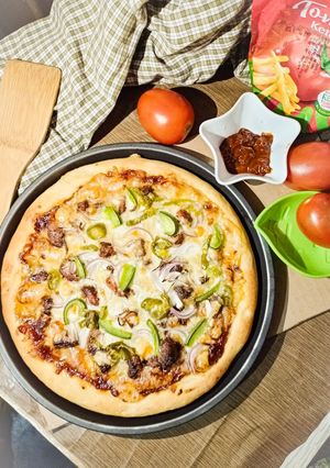 A picture of Afghani Pizza.