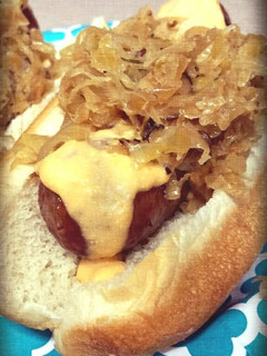 A picture of Tailgater Beer Brats with Zippy Cheese Sauce.