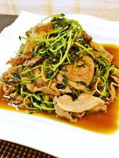 A picture of Pork Bits and Pea Shoots Stir-Fried with Ginger and Pepper.