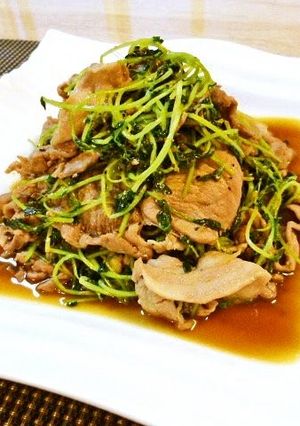 A picture of Pork Bits and Pea Shoots Stir-Fried with Ginger and Pepper.