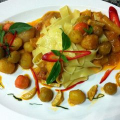 A picture of Tagliatelle In Sweet Potato Red Curry Sauce.