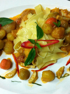 A picture of Tagliatelle In Sweet Potato Red Curry Sauce.