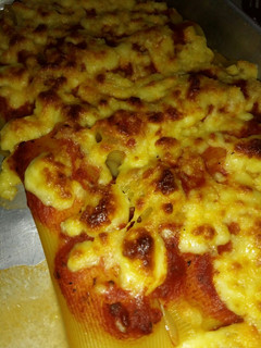 Una foto de Canelones al horno rellenos de queso