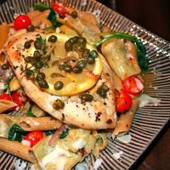 A picture of Chicken picatta w/artichoke hearts.