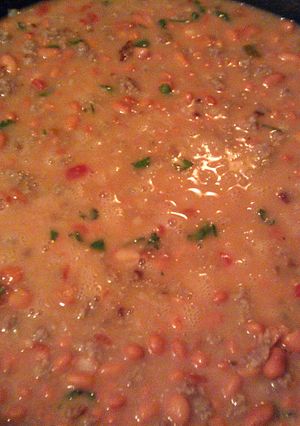 A picture of Easy pinto beans with sausage.