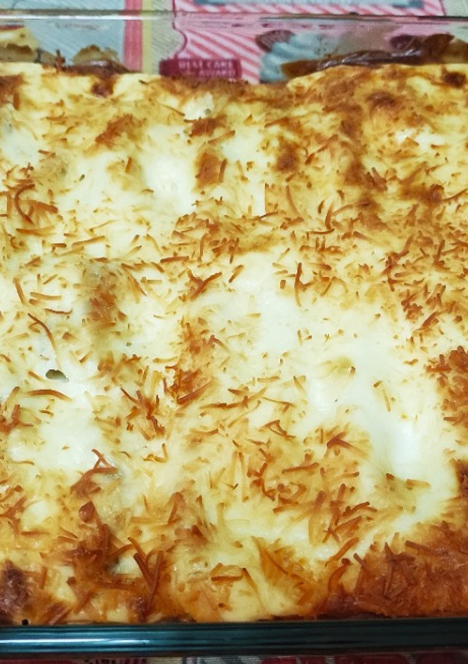 Una foto de Canelones de carne con bechamel