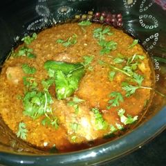 A picture of Chicken qorma.