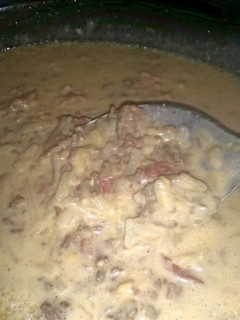 A picture of Crock pot bacon cheeseburger soup.