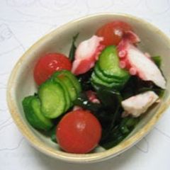A picture of Vinegar Dish with Cherry Tomatoes.