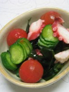 A picture of Vinegar Dish with Cherry Tomatoes.