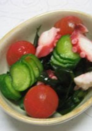 A picture of Vinegar Dish with Cherry Tomatoes.