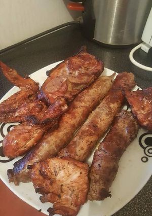A picture of Smoked Chicken and Sausage.